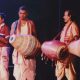 Group Of Folk Singers Playing Folk Ballad In A Stage Performance.