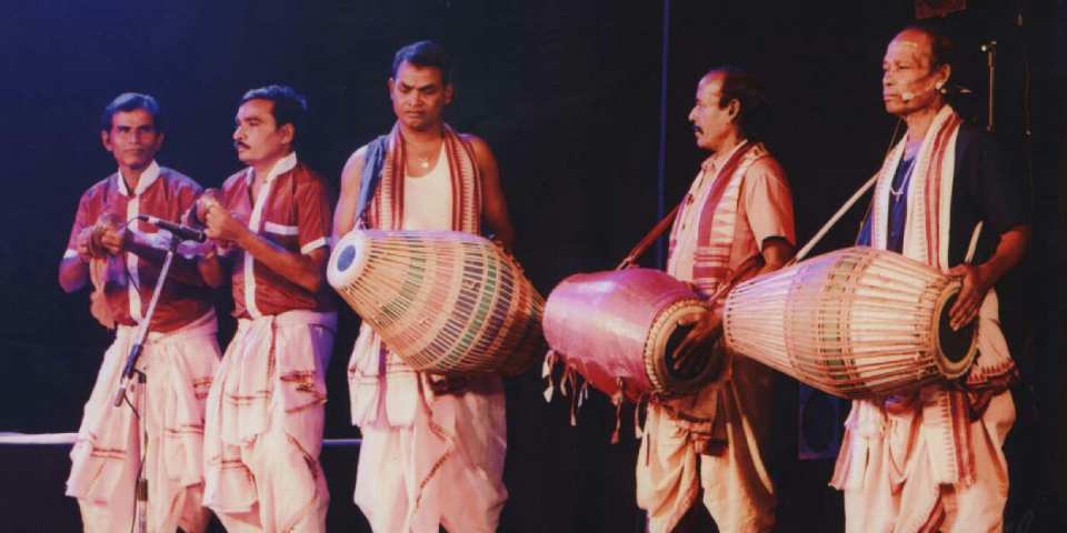 Group Of Folk Singers Playing Folk Ballad In A Stage Performance.