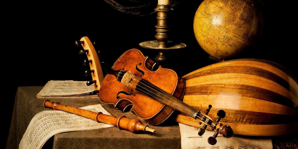 Various Tradional Indian Musical Instruments Placed On A Table.