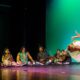 An Image Representing South Indian Musicians Performing With Tradtional Music Instruments On Stage