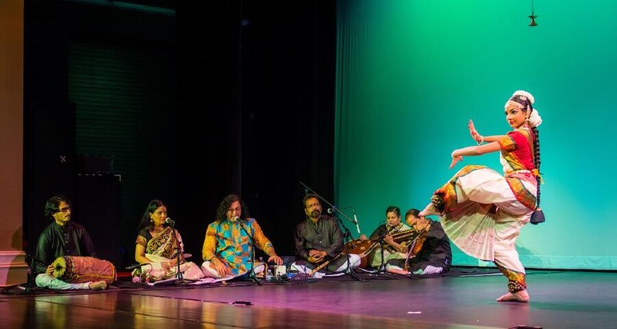 An Image Representing South Indian Musicians Performing With Tradtional Music Instruments On Stage